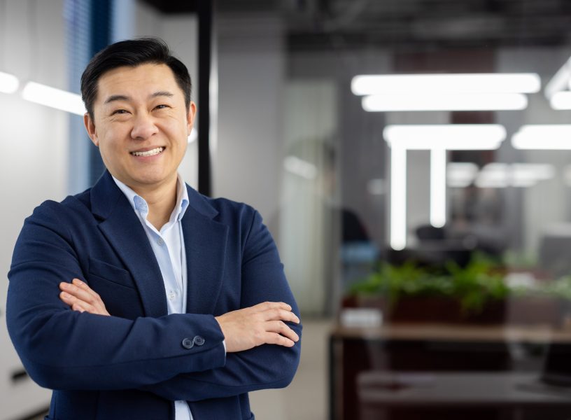 Portrait of successful asian businessman inside office at workplace, man in business suit smiling looking at camera, mature boss with crossed arms, successful financier broker Portrait of successful asian businessman inside office at workplace, man in business suit smiling looking at camera, mature boss with crossed arms, successful financier broker.